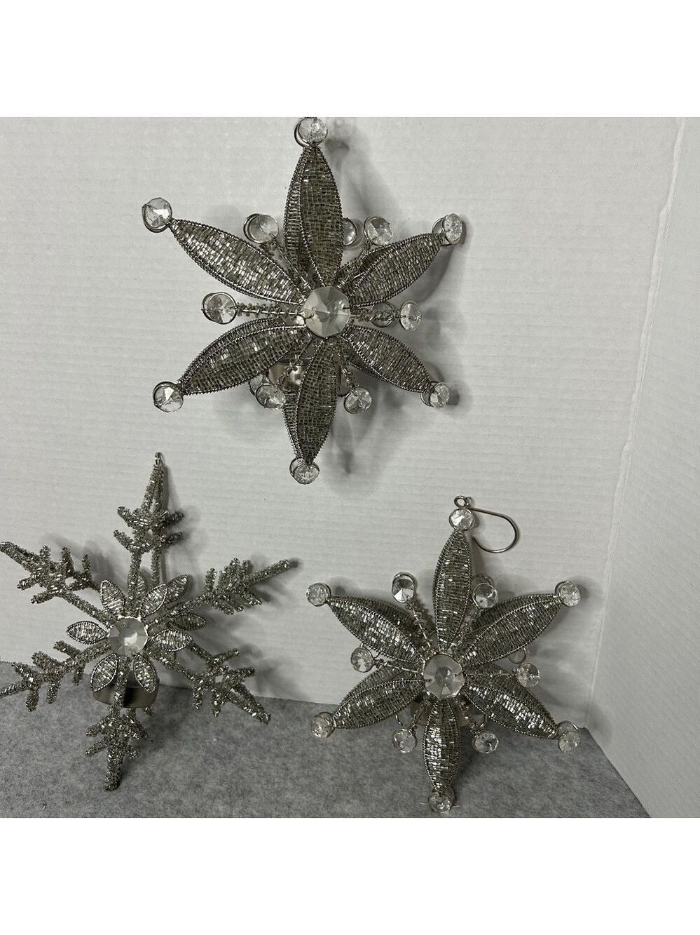 Set of 3 Holiday Beaded Star Tealights. 9x4”. Hooks on 2 of them. 2 different de